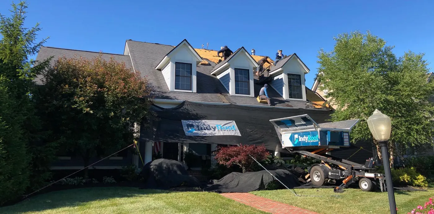Storm damage documentation on a Harvest Meadows commercial building